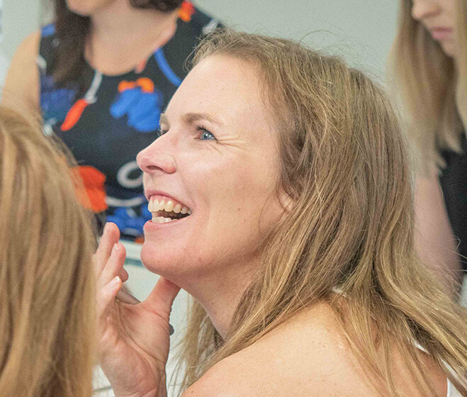 hero - A attendee looking up and laughing during a New Zealand Office 365 workshop or course